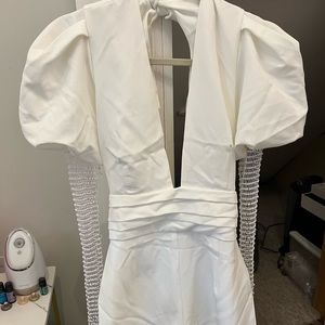 Fashion Nova Make a statement romper in white. Perfect for bachelorette.